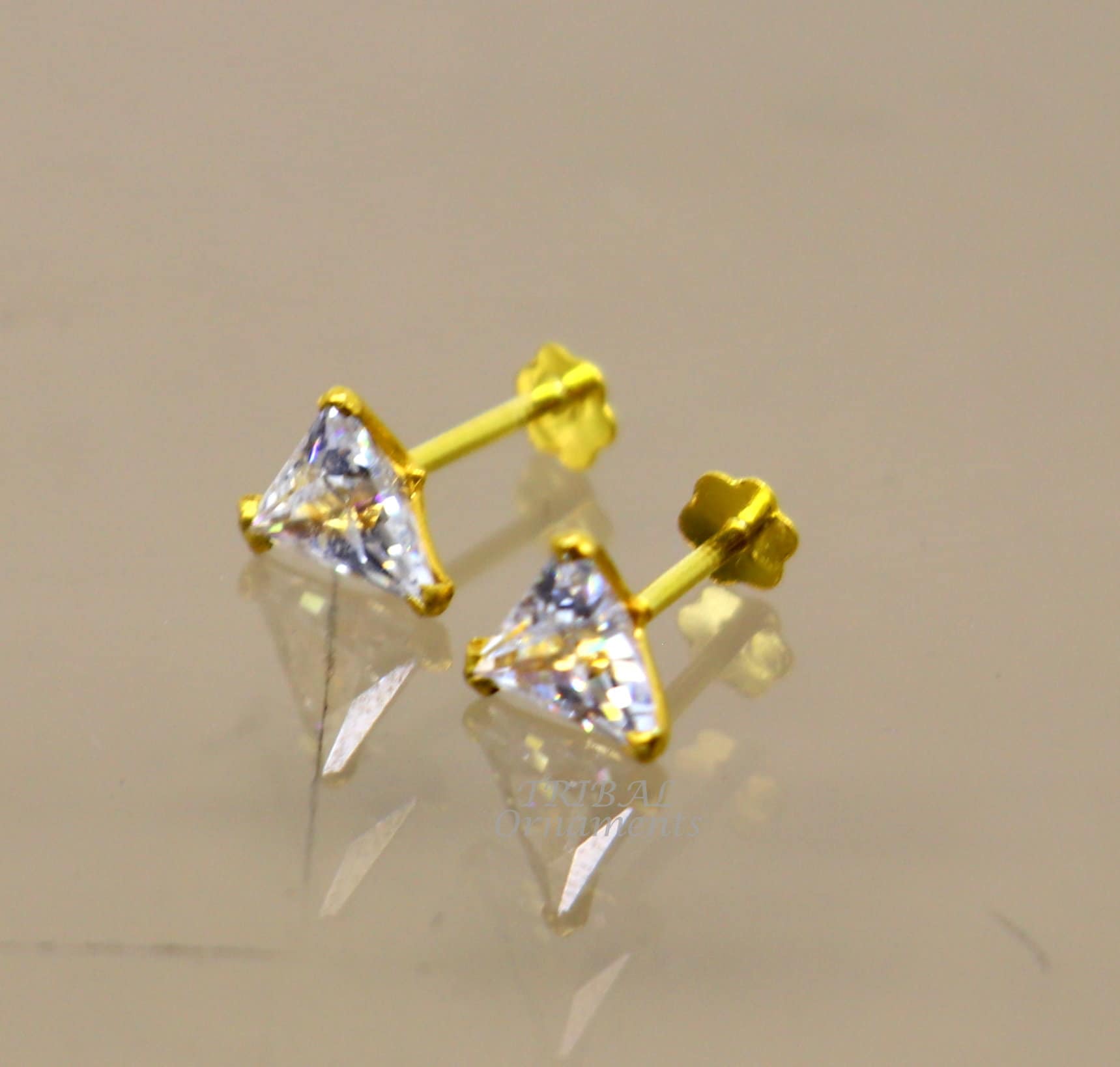 Gold earrings single best sale stone