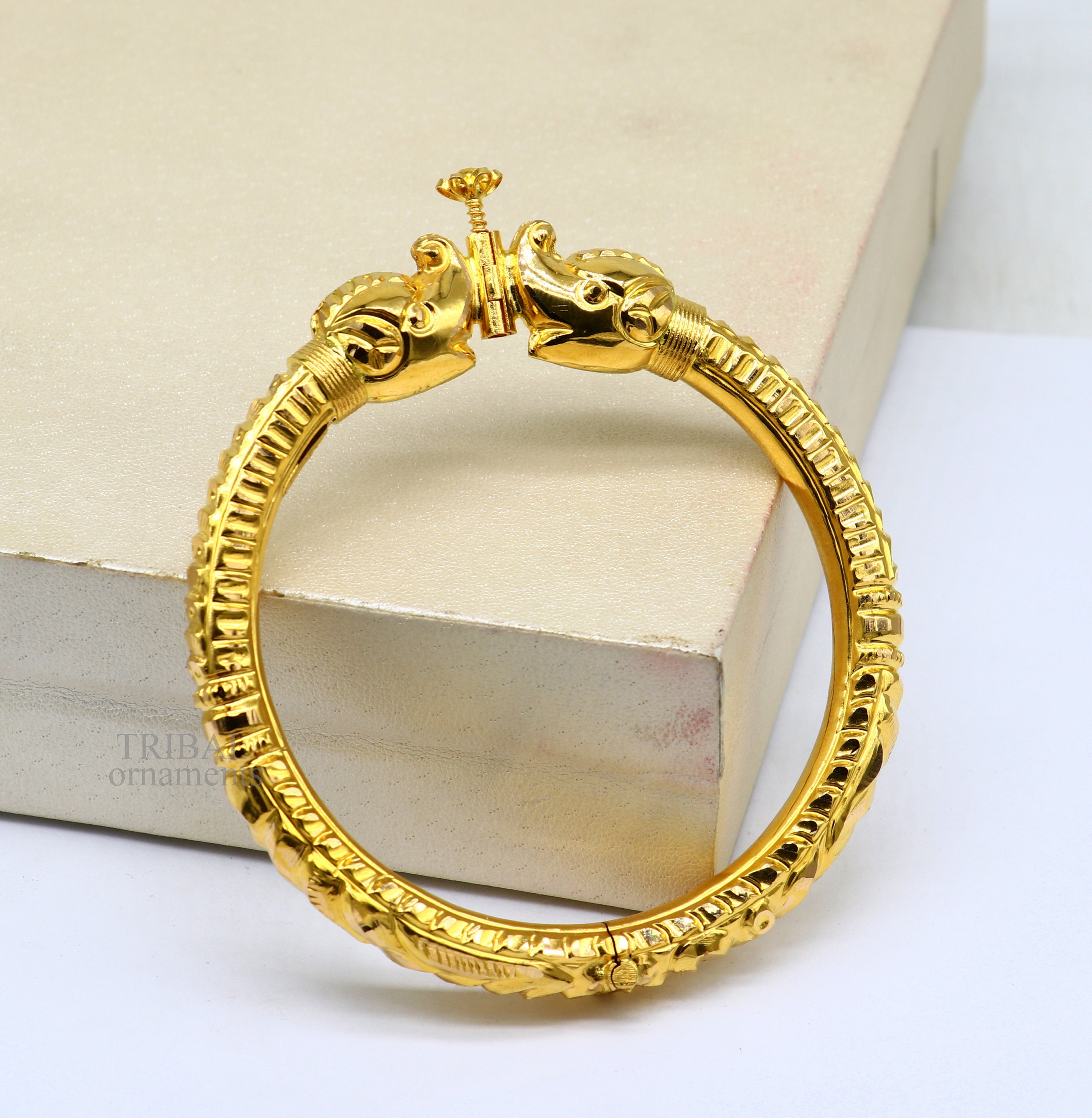 Elephant face gold bangles best sale