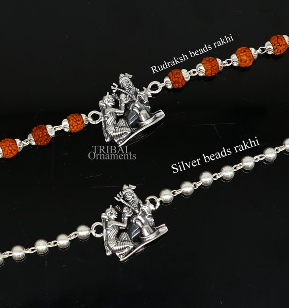 Pure silver rakhi bracelet clearance