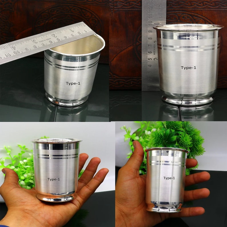 Op de afbeelding: Vier zilveren drinkglazen met een zilveren band rond het midden. De glazen zijn gelabeld "Type-1".