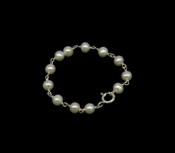 Seaspray Jewellery • White 5mm Round Freshwater Pearl Bracelet Strung  Knotted