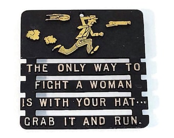Vintage Black Metal Trivet – Funny Man Running Wall Hanging – Rustic Farmhouse Humor (5" Square)
