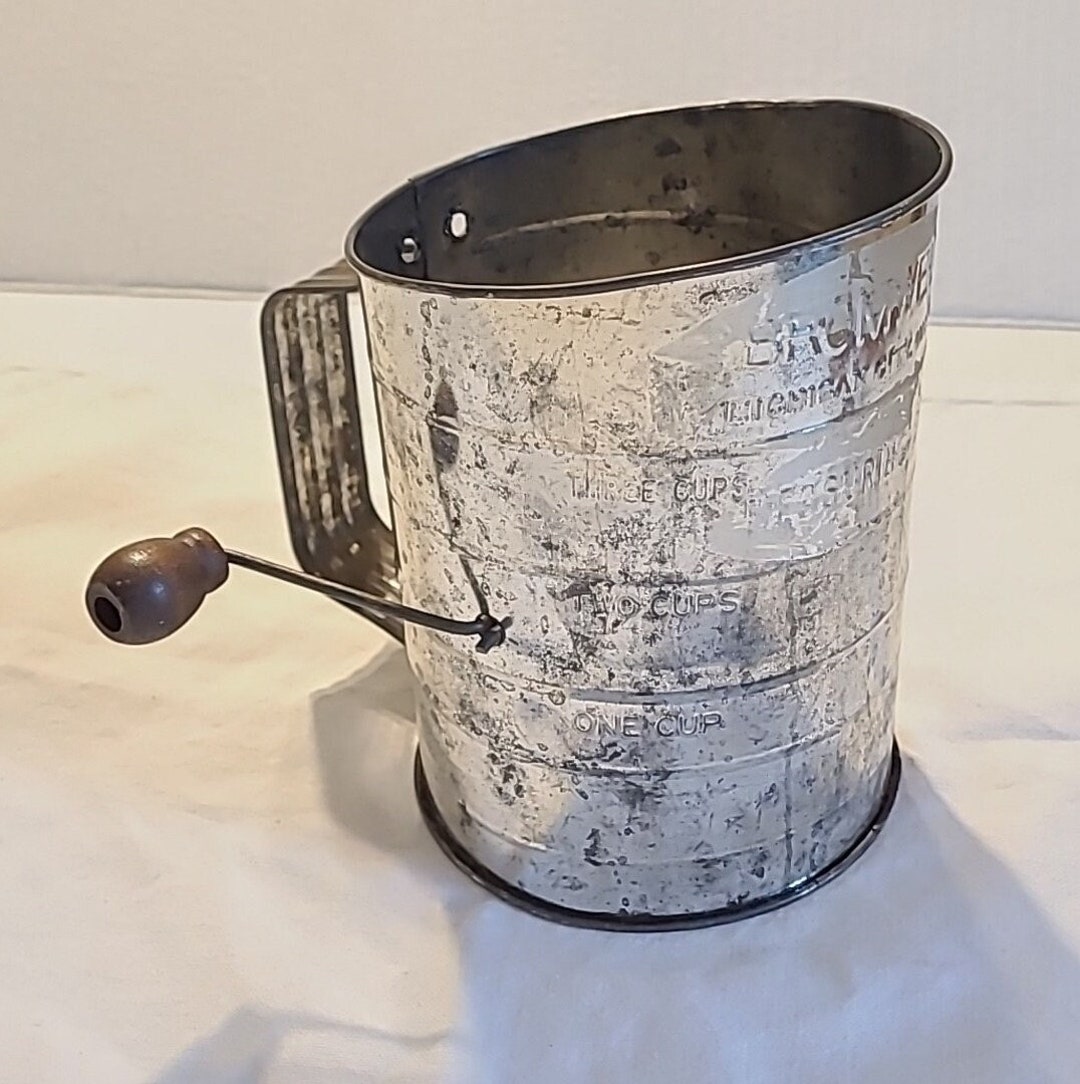 Bromwell Flour Sifter Made of Metal and Has a Brown Wood Handle 3 Cup