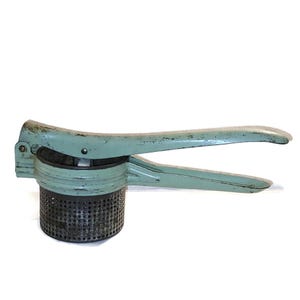 Vintage Metal Potato Ricer: Retro Kitchen Tool for Mashing, Straining & Food Preparation