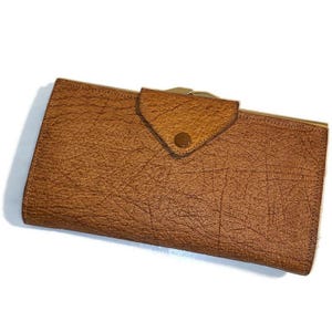 Cartera vintage de piel de cerdo Pebble: un accesorio organizador para bolso de mujer atemporal
