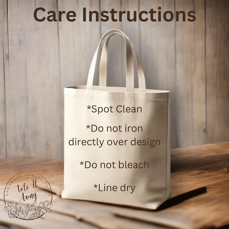 May include: A beige canvas tote bag with care instructions printed on the front. The instructions read: *Spot Clean *Do not iron directly over design *Do not bleach *Line dry