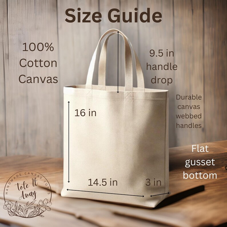 May include: A beige tote bag made of 100% cotton canvas with a flat gusset bottom and webbing handles. The bag measures 16 inches tall, 14.5 inches wide, and 3 inches deep. The handles have a 9.5 inch drop.