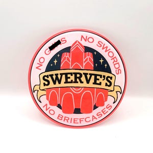 May include: A set of three ceramic mugs with a speckled, matte finish in cream, light grey, and dark grey. Each mug has a simple, minimalist design, suitable for coffee or tea.