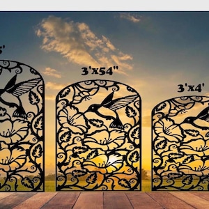 May include: Three black metal garden art panels with a hummingbird and floral design. The panels are arched and measure 3 feet by 5 feet, 3 feet by 54 inches, and 3 feet by 4 feet. The panels are set against a sunset sky.