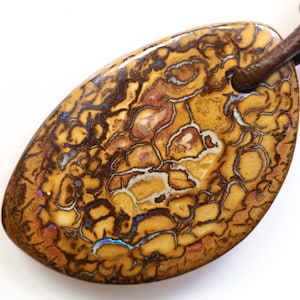 30 Carats Drilled Boulder Opal Pendant