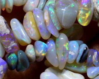 114.35 carats Lightning Ridge Opal Bead Strand - all natural