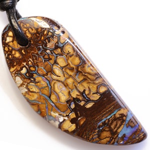 46.30 Carats Drilled Boulder Opal Pendant