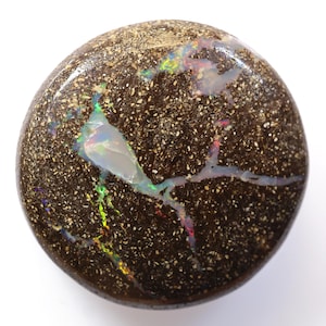 29.55 Carats Boulder Pipe Opal Cut Stone