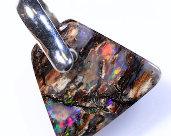 2.20 carats Drilled Boulder Pipe Opal Pendant