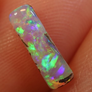 0.45 Carats Boulder Pipe Opal Cut Stone