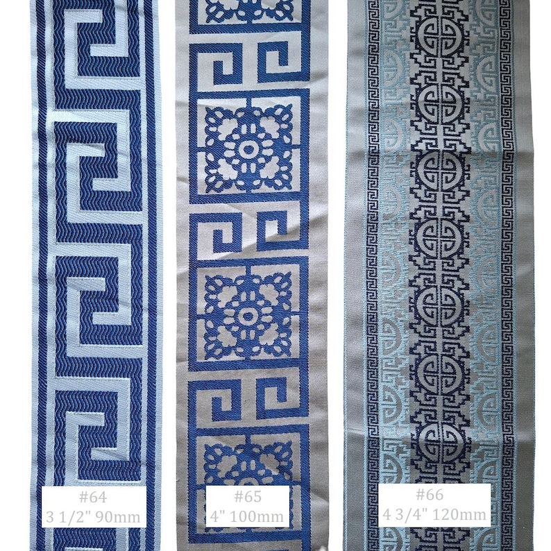 May include: Three decorative fabric ribbons with geometric patterns. The first ribbon is blue and white with a Greek key design, 3 1/2 inches wide. The second ribbon is blue and white with a floral and square design, 4 inches wide. The third ribbon is blue and gray with a circular design, 4 3/4 inches wide.