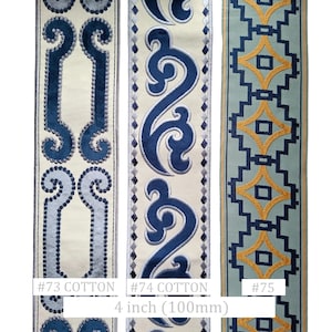 May include: Three decorative fabric trims with intricate designs. The trims are in shades of blue, cream, and gold. The text on the image reads "#73 COTTON", "#74 COTTON", "#75", and "4 inch (100mm)".