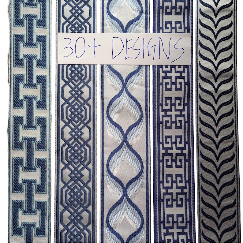 May include: A collection of decorative fabric ribbons with various geometric and abstract patterns in shades of blue and gray. The ribbons feature designs such as interlocking shapes, woven patterns, and stylized wave motifs. The text "30+ DESIGNS" is handwritten on a white card.