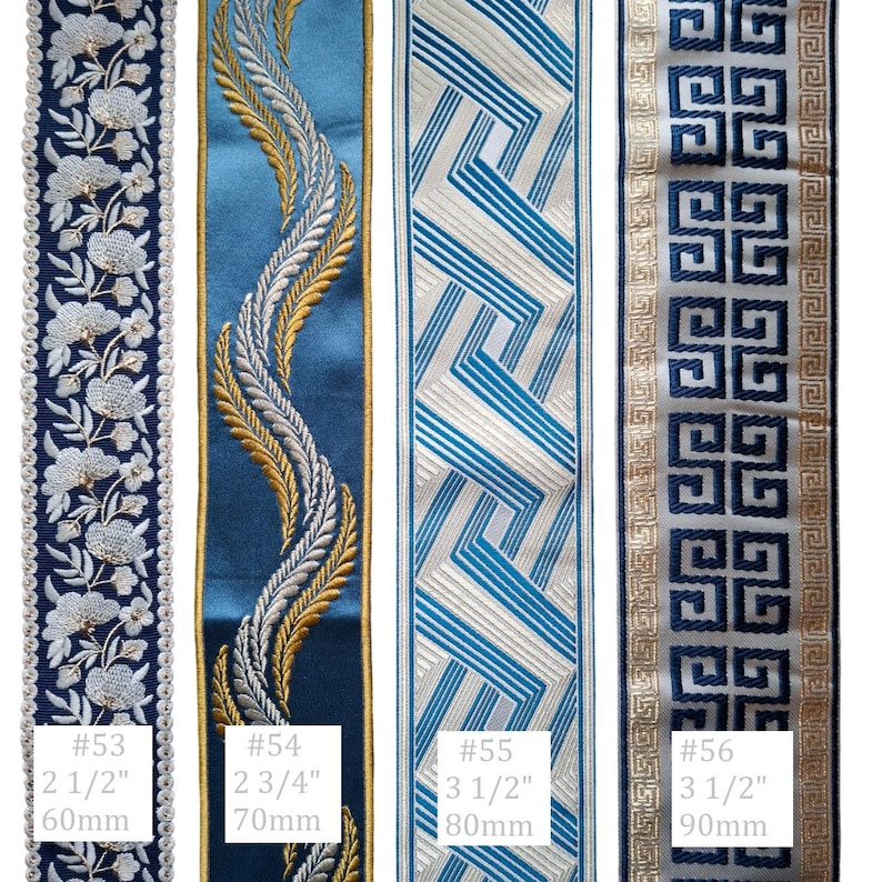 May include: Four decorative ribbons with intricate designs. The ribbons are in shades of blue, white, and gold. The first ribbon has a floral pattern, the second has a feather design, the third has a geometric pattern, and the fourth has a Greek key design. Measurements are included.