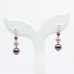 Dangling earrings with pearly Swarovski crystal beads in wine and bronze on 925 silver studs