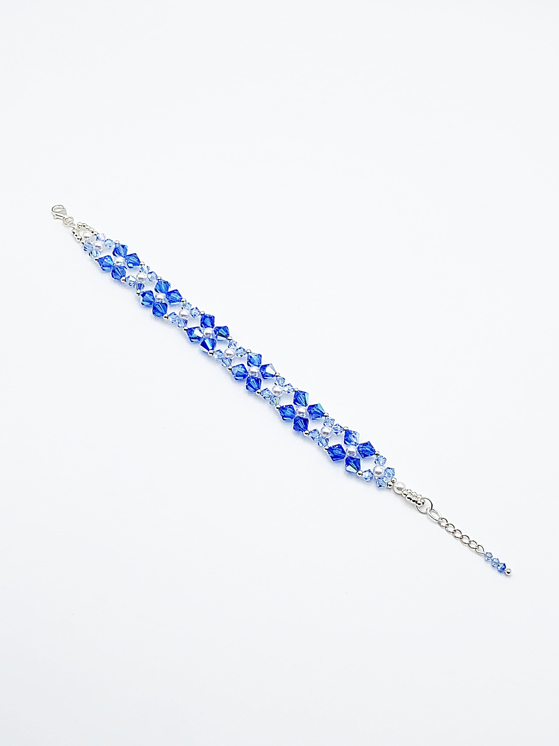 Cuff Bracelet in White Pearls and Blue Crystal Beads by