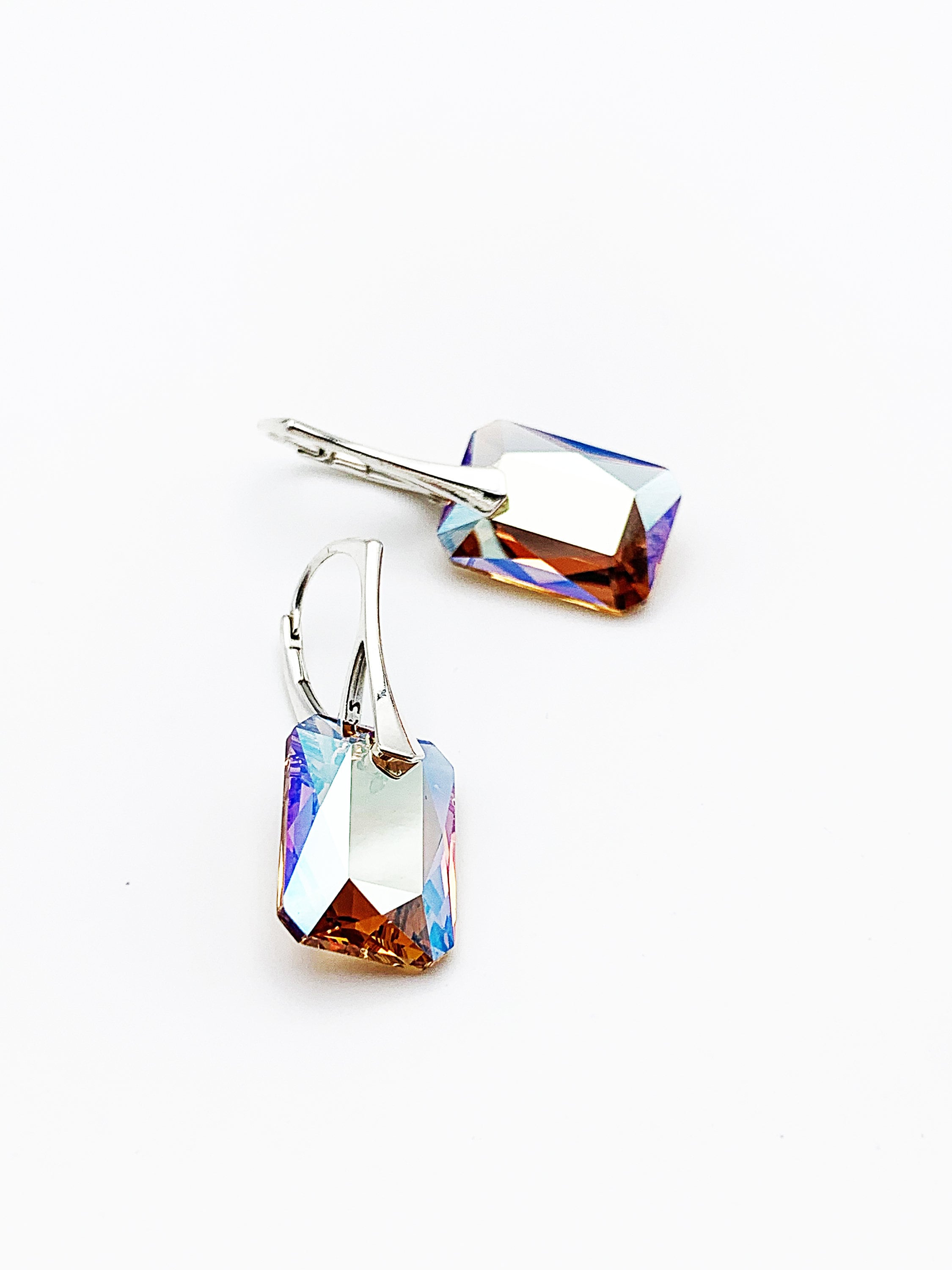 Light brown rectangular Swarovski crystal pendant earrings with colorful reflections on 925 silver stud earrings