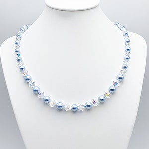 Blue pearly pearl and transparent Swarovski crystal necklace with multicolored reflections, crystalAB, light blue, 925 silver clasp