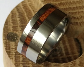 Unique handmade polished titanium and Santos Rosewood ring.