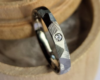 Faceted titanium band with flush set gemstone. Minimalist stacking ring. Handmade and customizable.