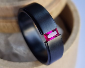 Brushed black zirconium tension ring with baguette cut gemstone setting. Handmade and customizable.