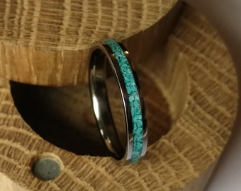 Handmade women's titanium band with turquoise inlay. Handcrafted.