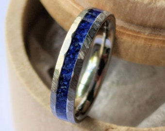 Faceted titanium band with lapis lazuli channel. Mens/womens unisex ring.