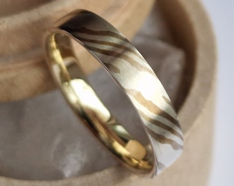 Shibuichi mokume-gane ring with gold lining. (silver-shibuichi mokume). Brushed finish. Handmade and customizable.