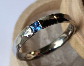 Titanium tension ring with Square Princess cut gemstone setting. Polished facets. Handmade and customizable.