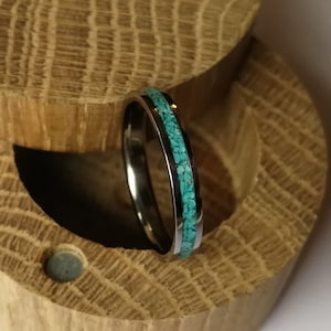 Handmade women's titanium band with turquoise inlay. Handcrafted.