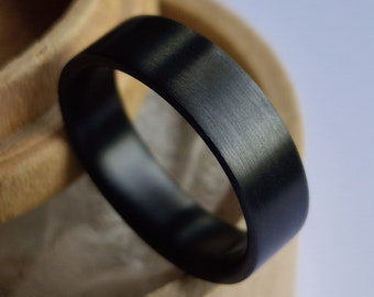 Black zirconium wedding ring. Minimalist black zirconium band. Handmade and customizable.