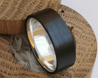 Brushed black zirconium band with sterling silver/gold inner lining. Handmade and customizable.