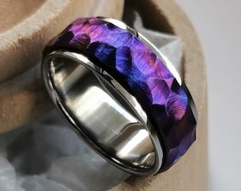 Titanium spinner ring "The Void". Anodized. Handmade and customizable.