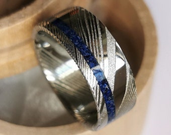 Unique handmade Stainless damascus steel band with Lapis Lazuli channel.