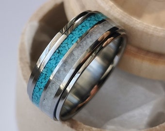 Titanium Spinner ring With Turquoise and Moonstone Channels.