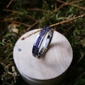 Unique handcrafted women's titanium  wedding band with Amethyst and Purple Jade inlay. product logo