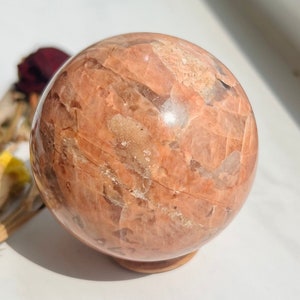 Peach Moonstone Crystal Sphere with Wooden Stand (65mm, 320g)