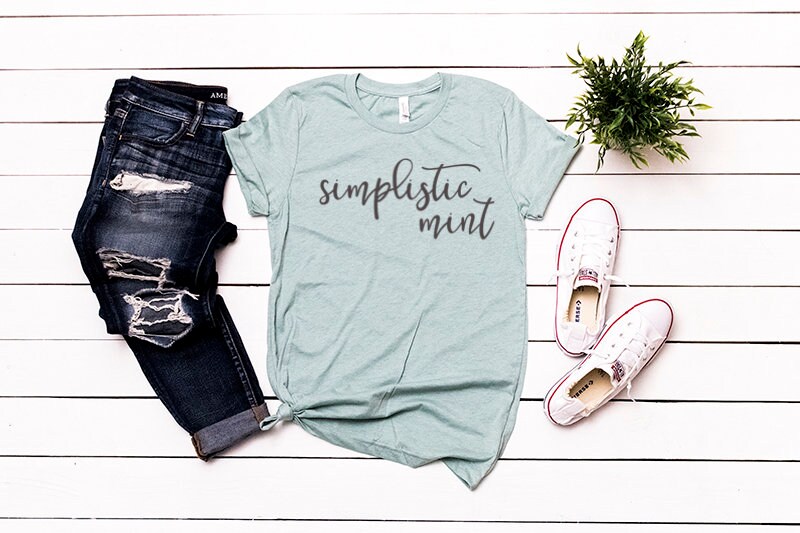 Bella Canvas 3001 Mockup Styled Flat Lay Bella Canvas Heather Prism Ice Blue Shirt Mockup Tied T Shirt Mockup Hanging T Shirt Mockup