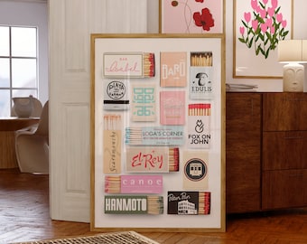 May include: A framed collage of matchbox labels with various restaurant and bar names, including "Isabel", "Baro", "Playa Cabana", "Rua Vang", "Edulis", "Scaramouche", "El Rey", "Canoe", "Hanmoto", "Fox on John", "Peter Pan", and "Loga's Corner".