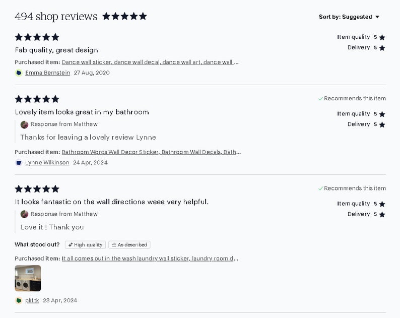 May include: A digital display of three customer reviews for an online shop, featuring five-star ratings, text comments, and links to purchased items including dance wall stickers, bathroom wall decor, and laundry room wall decals with dates.