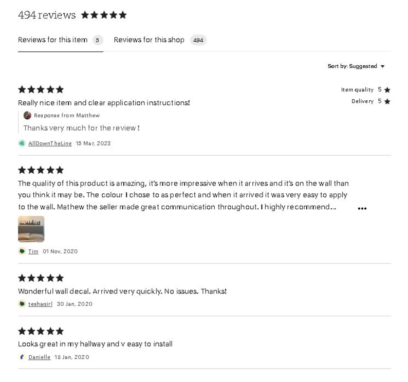 May include: A digital interface displaying 494 reviews with a five-star rating system. The screen shows customer feedback for a wall decal, including text reviews, star ratings, item quality scores, delivery ratings, and seller responses.