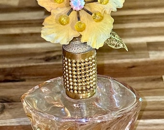 Vintage I. W. Rice perfume bottle with rhinestone floral collar