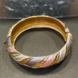 Vintage soft pink, white, & grey enamel gold tone hinged bangle bracelet