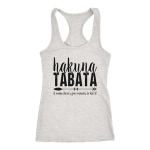 May include: A light gray racerback tank top with the words "hakuna TABATA" in black script and block letters. Below the text is an arrow with a barbell and the phrase "it means there's four minutes to hiit it!"