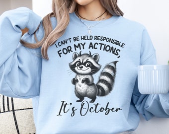 Funny Raccoon Halloween Sweatshirt: Devilish October Design